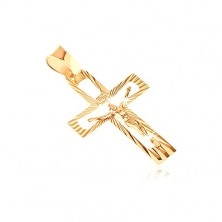 Pendant made of gold - cut-out cross with Christ and shiny rays