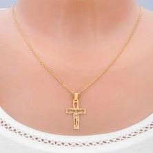 Pendant made of gold - cut-out cross with Christ and shiny rays