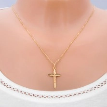 Gold pendant - cross with incised bars and three-dimensional Jesus
