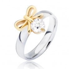 Steel ring with golden bow and clear zircon