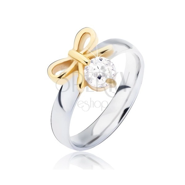 Steel ring with golden bow and clear zircon