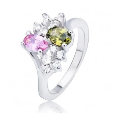 Ring with two colourful oval zircons and clear stones