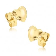 Sparkling gold earrings - irregular hearts, radial grooves