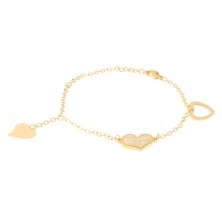 Golden wrist chain made of steel, heart contour, two asymmetrical hearts