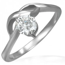 Engagement ring with round zircon and gentle waves