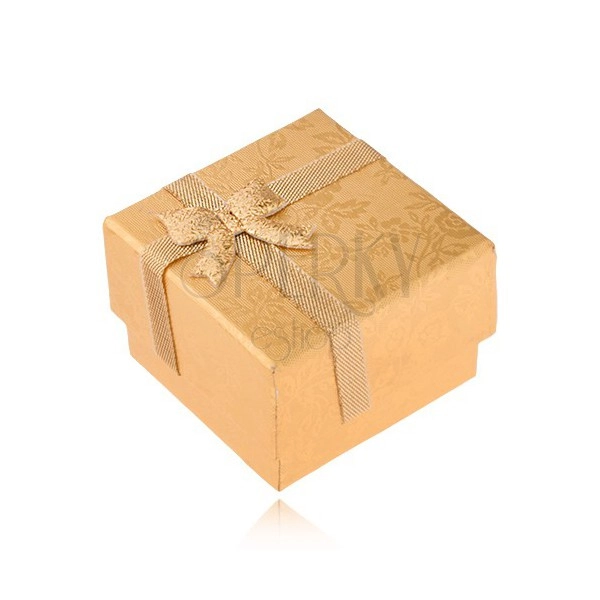 Gold gift box for ring with ribbon and bow, gold roses