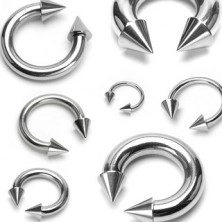 Piercing made of stainless steel, horseshoe ring with spikes