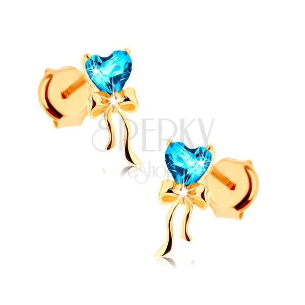 375 gold earrings - shiny bow, blue topaz heart