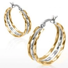 Hoop earrings made of steel, gold and silver tone, twisted lines