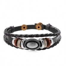 Bracelet made of black leather band with beads of metal and wood, oval with notches