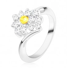 Sparkly ring in silver hue, round yellow zircon in clear oblong