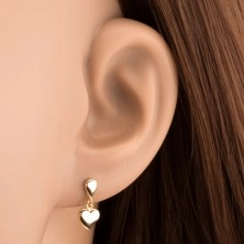 Stud earrings made of yellow 14K gold - small teardrop and dangling heart