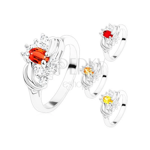 Ring in silver hue with smooth shiny arcs, coloured and clear zircons