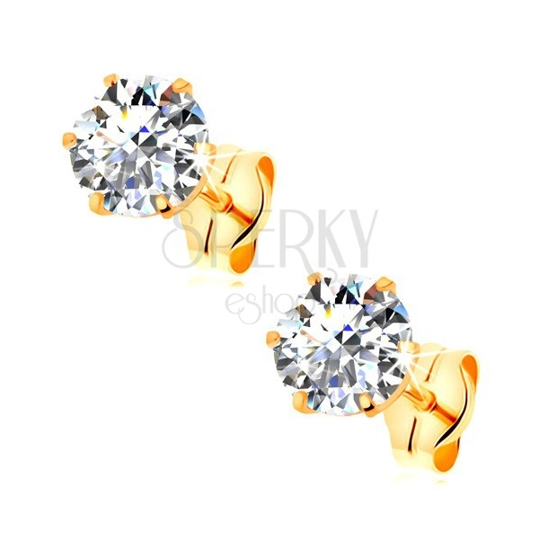 Earrings made of yellow 14K gold - clear round zircon in mount, 5 mm