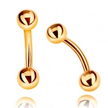 Piercing made of yellow 9K gold - two shiny smooth balls, bent barbell