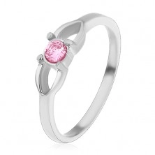 Steel children's ring, contour of bow and round pink zircon in the middle