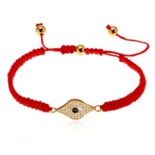 Adjustable red bracelet made of strings, symbol of eye decorated with clear zircons
