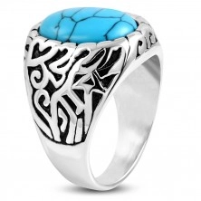 Steel ring, turquoise oval, shoulders decorated with cutouts and black patina