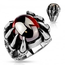 Massive ring made of 316L steel, oval dark red zircon between claws