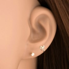 Ear piercing made of yellow 14K gold - shiny tied bow
