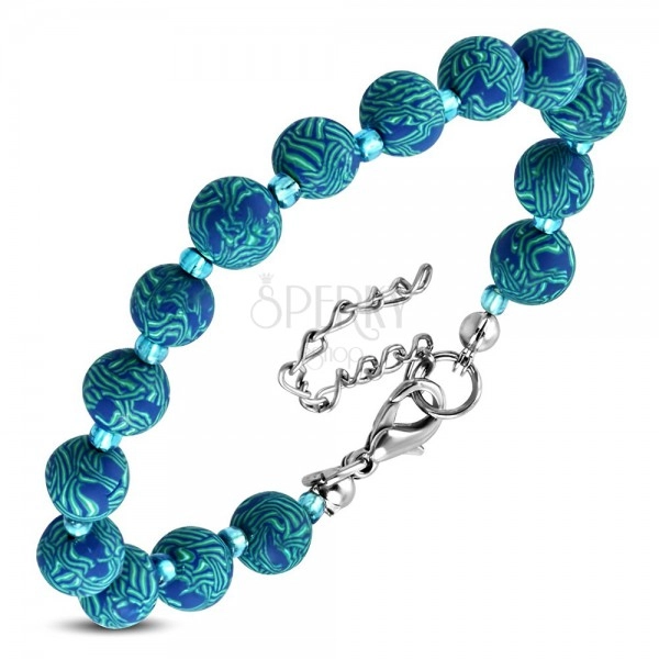 Blue bracelet, bigger patterned FIMO balls and tiny transparent beads