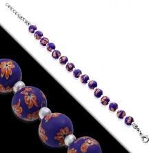 Purple bracelet, bigger FIMO balls with flowers and small transparent beads