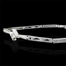 Ladies bracelet - tension set zircon and diamond shapes