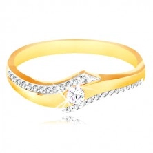 Ring of 14K gold - a wave with clear zircons and sparkling lines on the sides