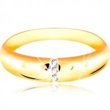 14K yellow gold wedding band with rounded surface and vertical zircon line
