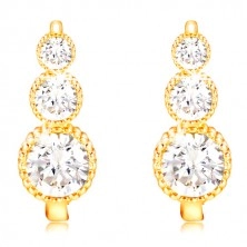 Earrings made of yellow 14K gold - clear zircon snowman, notched edges