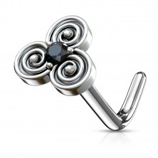 Curved steel nose piercing with a celtic motif, zircon in the middle
