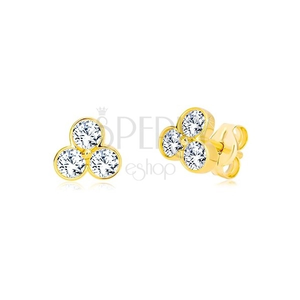 Yellow studs made of 585 gold - trefoil with glittery zircons