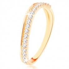 Ring made of yellow 9K gold - smooth and clear zircon wavy line