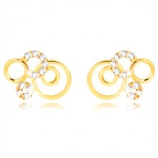 Yellow 375 gold earrings - ringlets and glittery transparent zircons