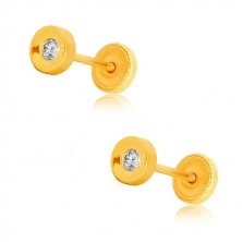 Yellow 375 gold earrings - bulgy holder with zircon, studs with screw backs