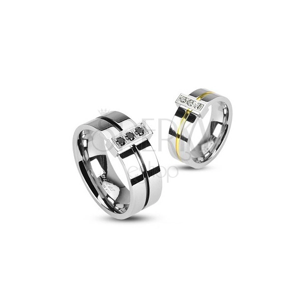 Stainless steel ring with three zircons