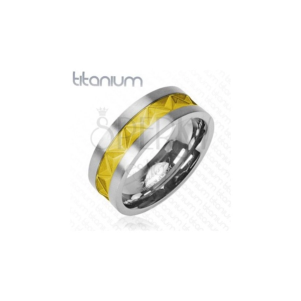 Titanium ring in silver color with decoration in gold color 