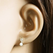 375 Golden earrings – a leaf with clear zircons and a white pearl