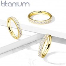 A Titanium ring in a golden shade – glittery clear zircons, 3 mm