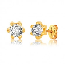 14K Yellow gold earrings – a clear colour zircon in a prong setting, flower motif