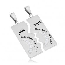 Two pendants made of 316L steel, rectangles in silver colour with inscriptions and zircons